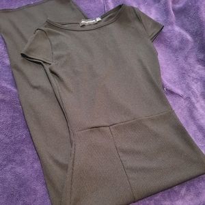 Long black ribbed dress with deep side slit